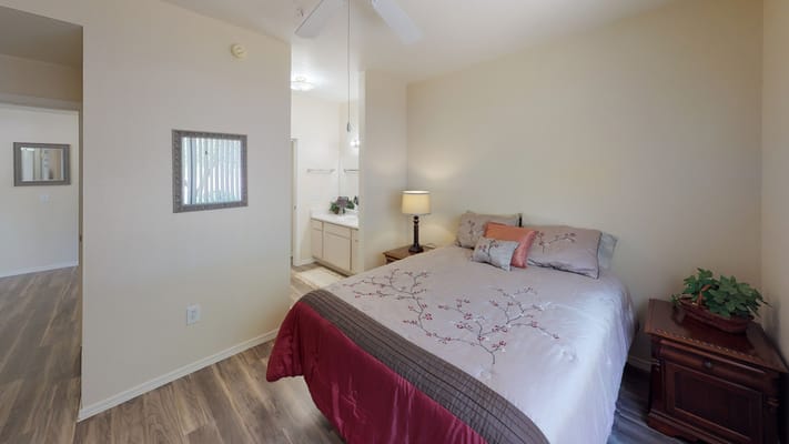 Cozy bedroom with elegant decor in a senior living facility