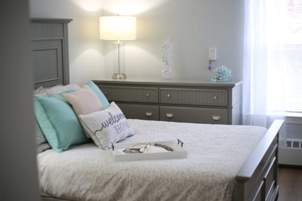 Cozy bedroom with welcoming decor in a senior living facility