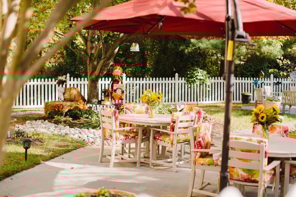 Outdoor seating area with colorful decor