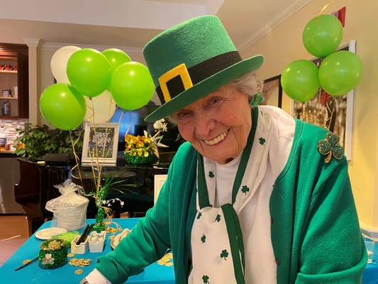 Resident celebrating St. Patrick's Day with decorations