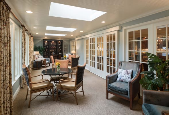 Bright common area with comfortable seating and natural light