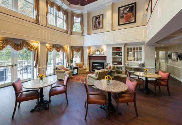 Bright and welcoming common area with seating and decor