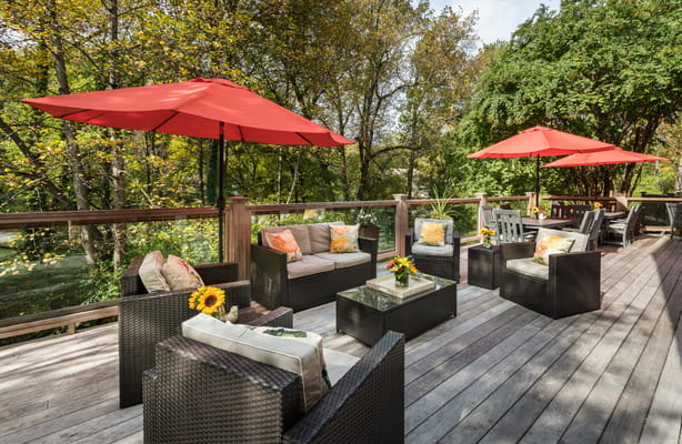 Outdoor seating area with umbrellas and flowers