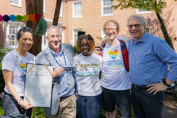Group of people celebrating in an outdoor setting