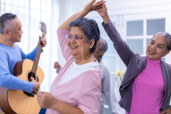 Residents enjoying a musical activity together