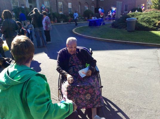Residents interacting during an outdoor event