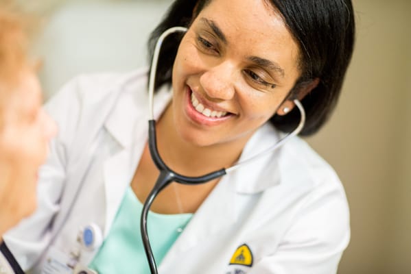 Healthcare professional engaging with a resident