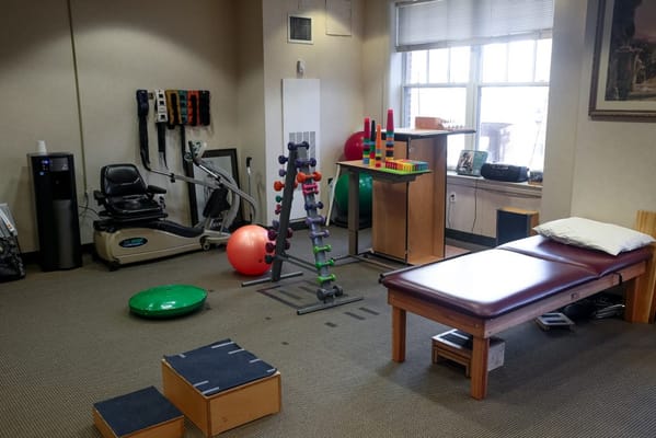 Physical therapy equipment in a treatment room
