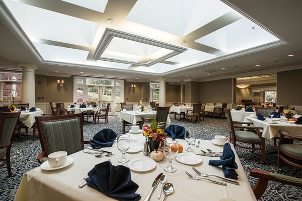 Bright dining room with elegant table setting