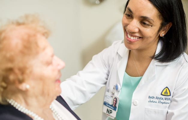 Healthcare professional interacting with a resident
