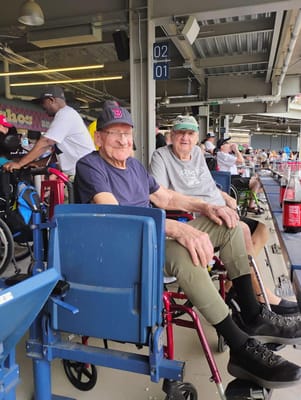 Two residents enjoying a day out at an event