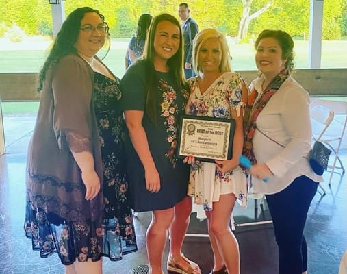 Group of staff celebrating an award