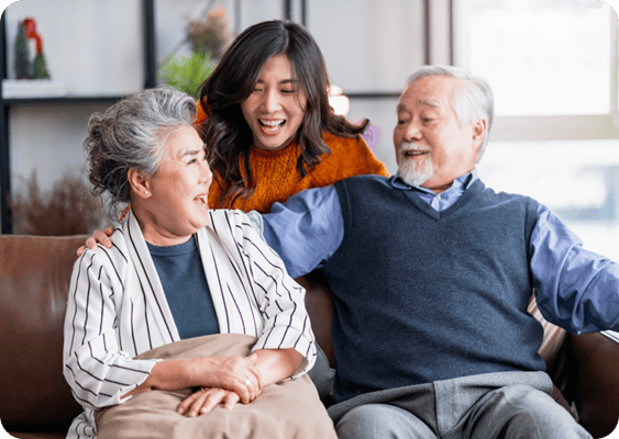 Residents enjoying a lighthearted conversation in the common area