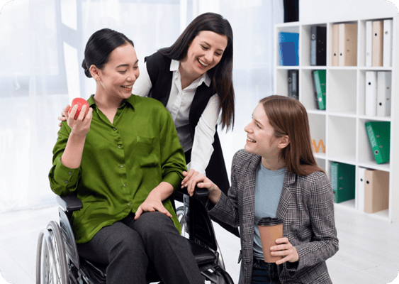 Staff and resident interacting in a bright interior