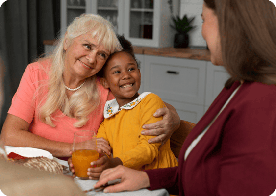 Resident enjoying time with a child in a cozy setting