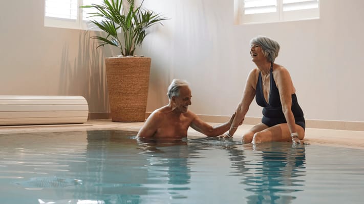 Residents enjoying a relaxing time in a pool