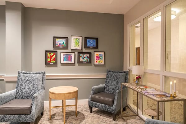 Interior lounge with armchairs and artwork