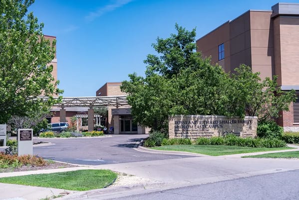 Entrance view of the assisted living facility with landscaping