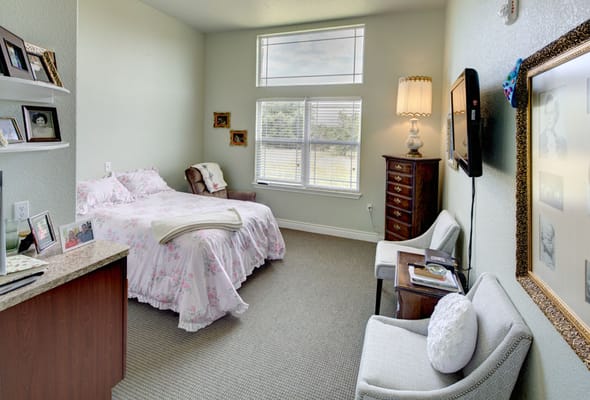 Cozy private resident room with floral bedding