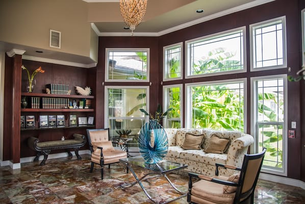Bright interior of a common area with large windows