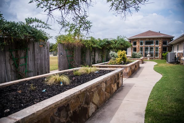 Pathway leading to a garden area at the facility