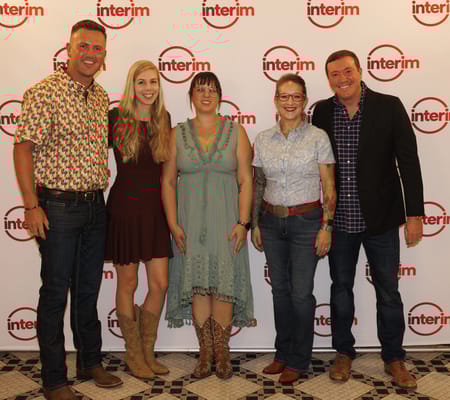 Group of staff members posing for a photo