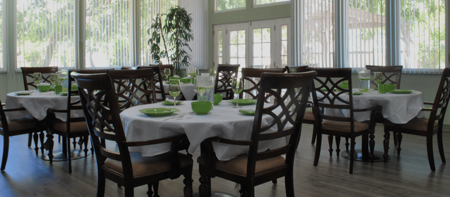 Dining area with tables set for a meal