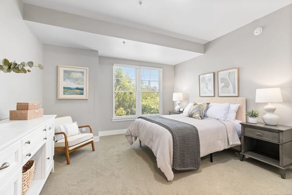 Bright and inviting resident bedroom with natural light