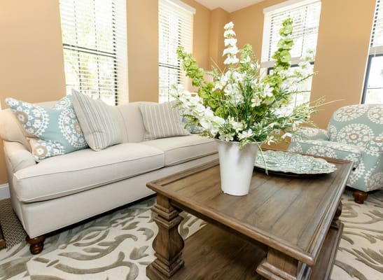 Bright interior living room with floral arrangement