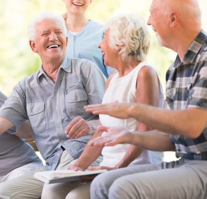 Happy residents engaging outdoors in a social setting