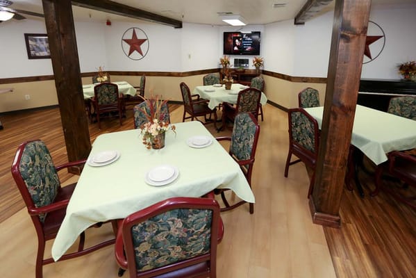 Interior dining area with tables and chairs