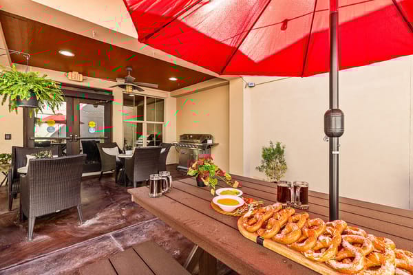 Outdoor dining area with pretzels and drinks