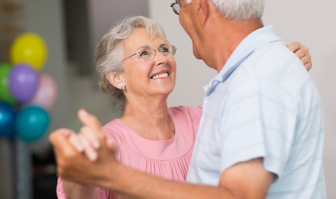Residents dancing and enjoying an activity together