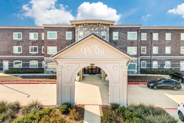 Exterior view of The Pearl Senior Living facility