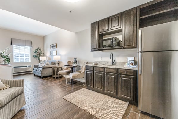 Stylish interior of a resident living space with kitchenette