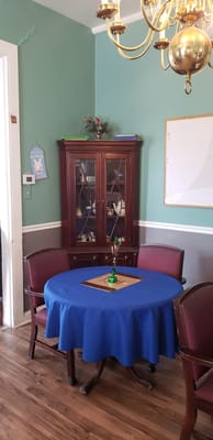 Cozy interior room with a table and chairs