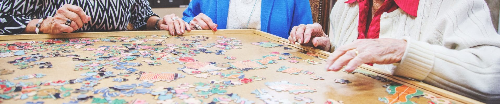 Residents engaging in a puzzle activity