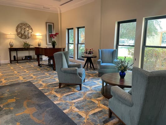 Interior common area with seating and natural light