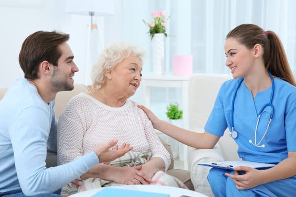 Staff member interacting with a senior resident