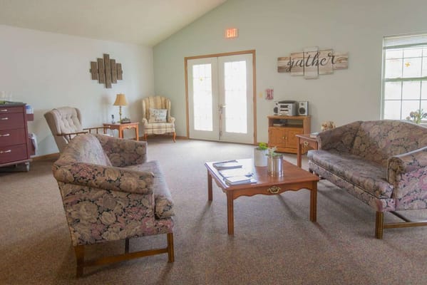 Bright common area with seating and decor
