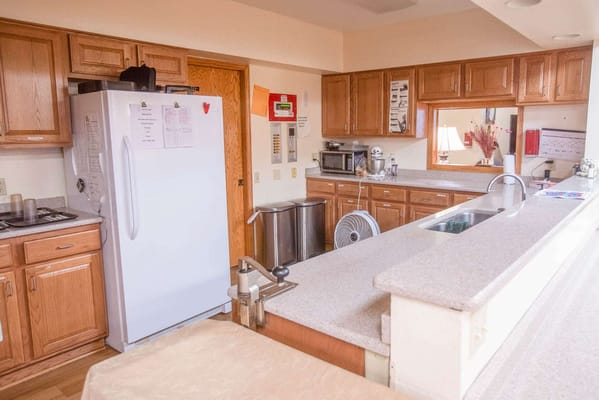 Well-equipped kitchen area in assisted living facility