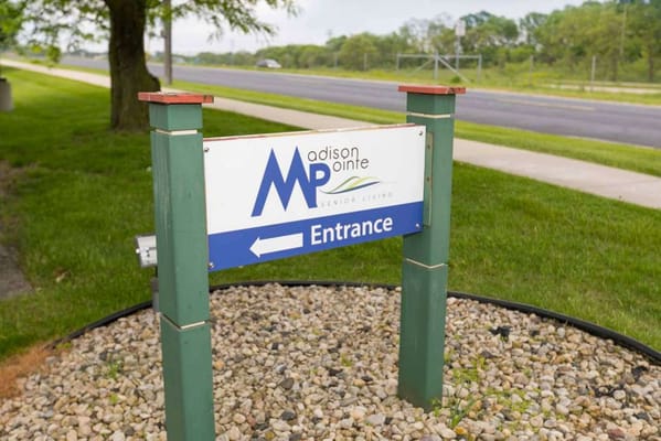 Sign directing to the entrance of Madison Pointe Senior Living