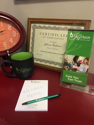 Interior display with branding materials and appreciation certificate