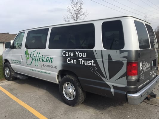 Facility transport van with branding