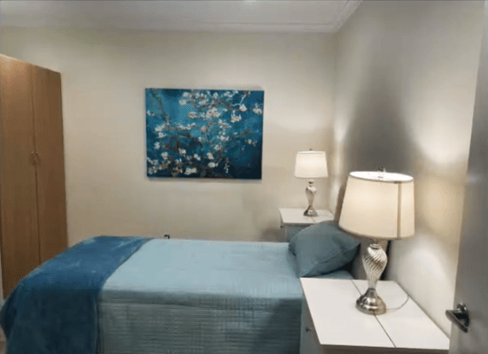 Cozy private resident room with blue decor