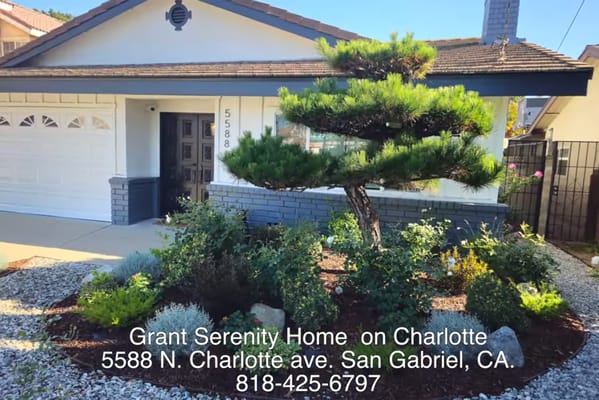 Exterior view of Grant Serenity Home surrounded by landscaping