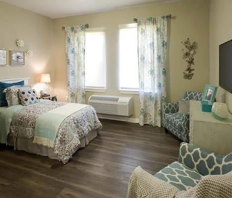 Cozy private room with floral decor and light curtains