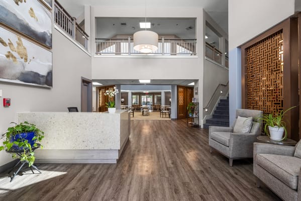 Bright lobby area with seating and reception desk