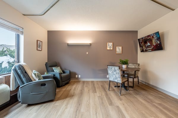 Bright and spacious interior view of a resident room