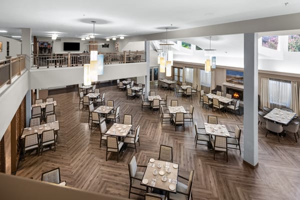 Dining area with tables set for a meal